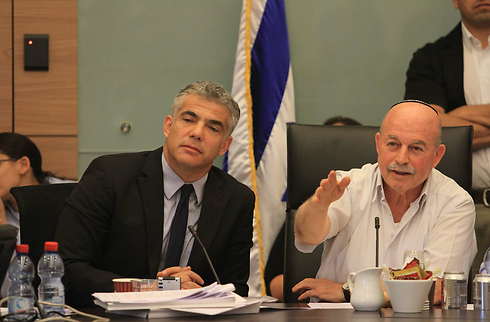 Former finance minister Yair Lapid with MK Nissan Smolianski at  Knesset's Finance Committee (Photo: Gil Yohanan) (Photo: Gil Yohanan)