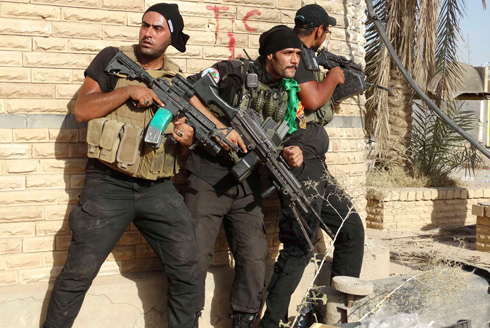 חיילי יחידת הקומנדו של עיראק מוכנים לקרב מול דאעש (צילום: רויטרס) (צילום: רויטרס)
