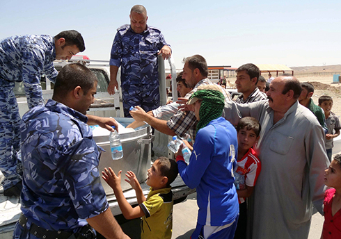 Kurds fleeing ISIS (Photo: AFP)