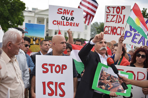 לחץ על אובמה. הפגנה בבית הלבן בקריאה לעצור את דאעש (צילום: AFP) (צילום: AFP)