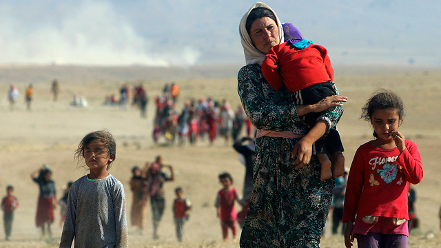 Yazidi refugees escaping the Islamic State in Iraq (Photo: Reuters/File)