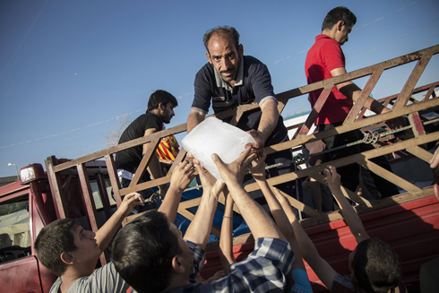 פליטים מאזור הקרבות של דאעש בעיראק (צילום: MCT) (צילום: MCT)