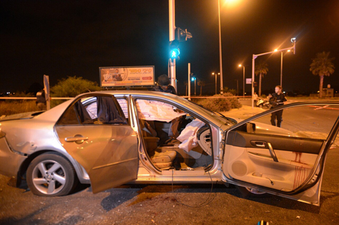 The Maman brothers' car after it was hit by shrapnel from the Grad rocket (Photo: Avi Rokach)