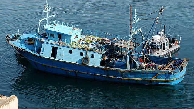 סירת מהגרים בנמל ואלטה, מלטה (צילום: AFP) (צילום: AFP)