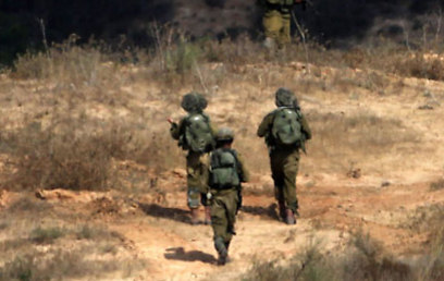 IDF soldiers in Operation Protective Edge. Many say their families have been reduced to hunger (Photo: AFP) 