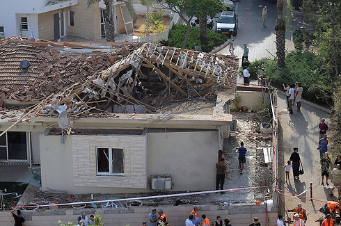 A home in Ashkelon damaged by rocket fire. (Photo: AFP) (Photo: AFP)