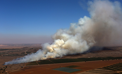 Smoke on the Syrian Golan Heights from clashes (Photo: EPA)