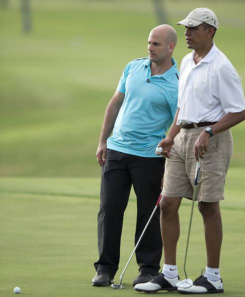 A close bond, Obama with Kass on the golf course (Photo: AP)