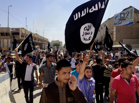 ISIS is not without supporters in Syria as seen in protests in the city of Ar-Raqqah. (Photo: Reuters) (Photo: AP)
