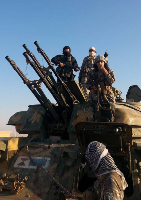 ISIS militants in Raqaa, Syria (Photo: AP) (Photo: AP)