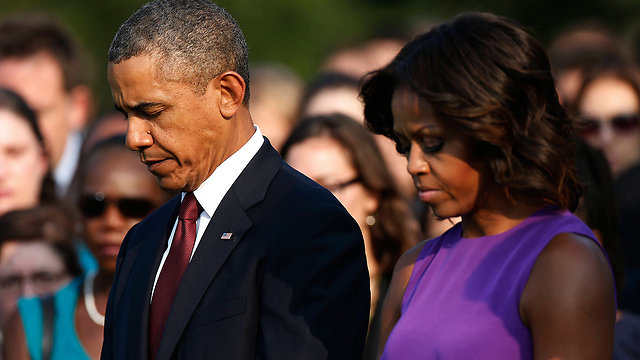 הנשיא האמריקני ישתתף בטקס הזיכרון בפנטגון. ברק ומישל אובמה (ארכיון) (צילום: AP) (צילום: AP)