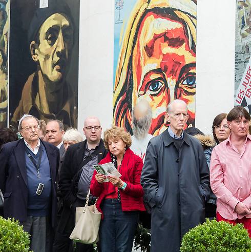 People listen to speeches during the re-opening ceremony of the Jewish Museum in Brussels (Photo: AP) (Photo: EPA)