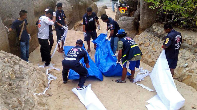 הנרצחים השתתפו במסיבת חוף שנערכה 100 מטרים ממקום מציאת גופותיהם. קו טאו (צילום: AFP) (צילום: AFP)