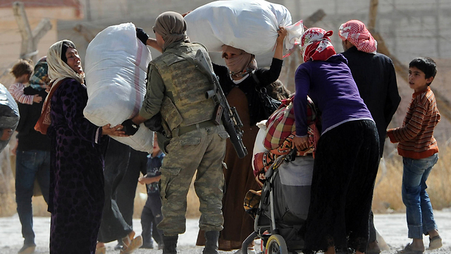 Kurdish refugees (Photo: Gettyimages)
