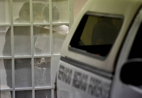 המכון לרפואה משפטית באיגואלה, אליו הובאו שרידי הגופות השרופות (צילום: AFP) (צילום: AFP)