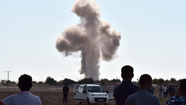 Strikes in Kobani (Photo: AFP)