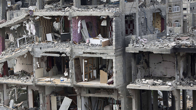 Destroyed building in the Strip (Photo: AFP)