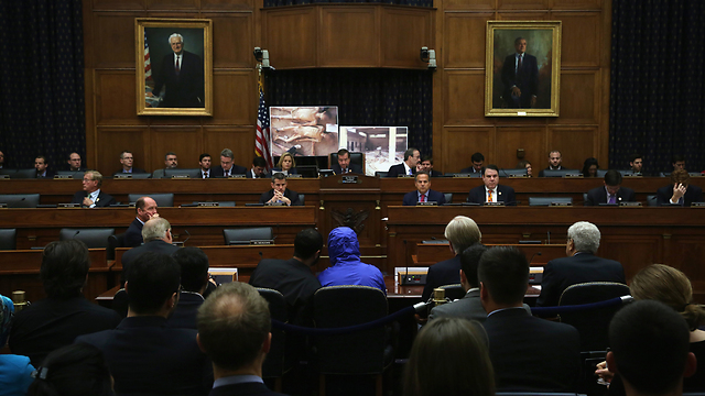 Syrian Army defector 'Caesar,' (in a blue hooded jacket at House Foreign Affairs Committee (Photo: Gettyimages) (Photo: Gettyimages)
