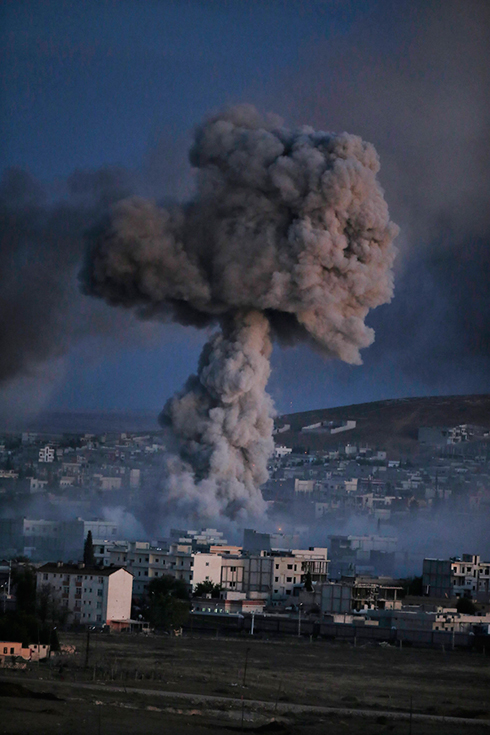 Smoke rises from a US strike on IS in the Syrian border town Kobani (Photo: AP) (Photo: AP)