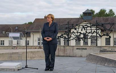 German Chancellor Angela Merkel at Dachau last year (Photo: AP)