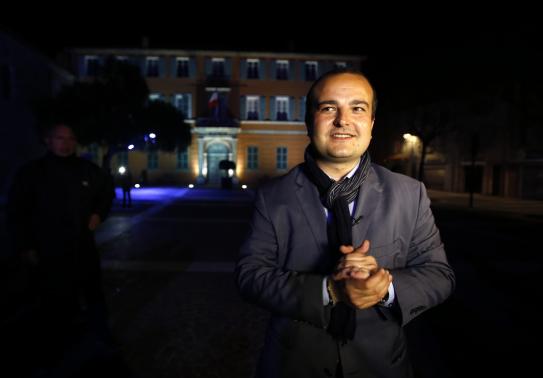 Mayoral candidate David Rachline of France's far-right National Front political party poses in front of the town hall (Photo: Reuters) (Photo: Reuters)