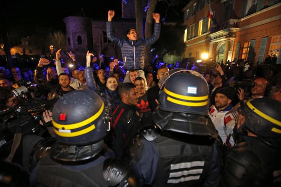 Demonstrators face riot policemen in front of campaign headquarters of mayoral candidate David Rachline after he won elections (Photo: Reuters) (Photo: Reuters)