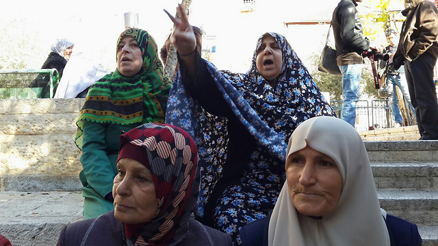 Dozens of women gathered to demonstrate. (Photo: Mohammed Shinawi)