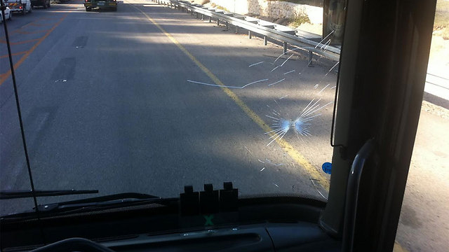 Bus hit with stone on Route 1