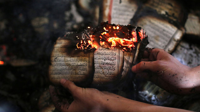 A similar arson attack on a Mosque in the West Bank by Jewish-Israeli settlers. (Photo: AFP) (Photo: AFP)