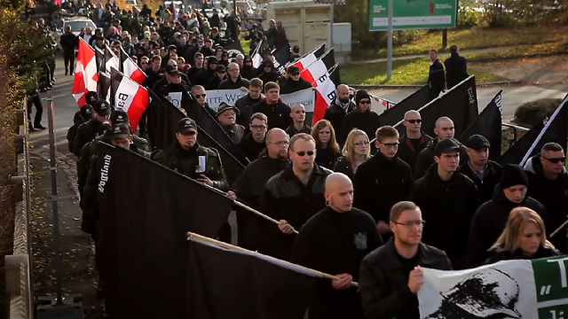 With flags and wreaths, neo Nazis commemorate a so called 'National Heroes' Remembrance Day.'