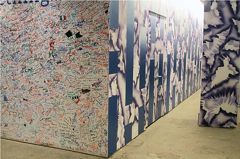 אומנות מוזמנת לצד חתימות המבקרים על הקיר של פייסבוק (צילום: יח"צ פייסבוק) (צילום: יח