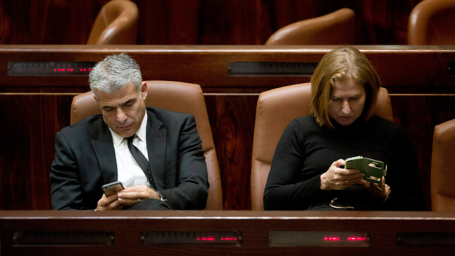 Lapid and Livni in the Knesset: The decision was made for them. (Photo: EPA) (Photo: EPA)