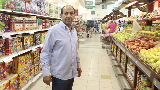 Owner Rami Levy in the supermarket. (Photo: Gil Yohanan)