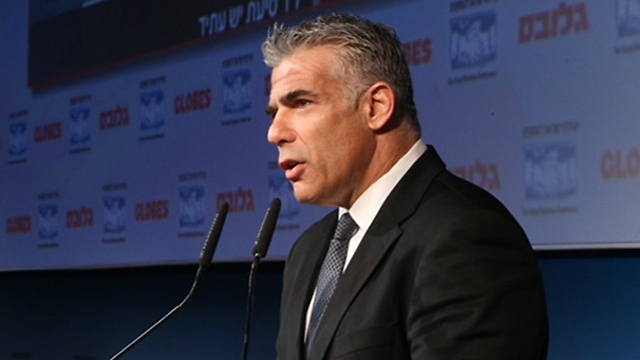 Lapid pulled no punches criticizing Netanyahu in his speech. (Photo: Motti Kimchi)