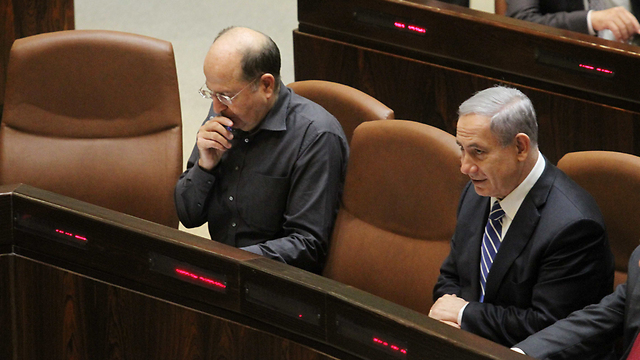 Moshe Ya'alon (left) ordered Muslim charities be shut for alleged ties to 'terror'. (Photo: Ido Erez)