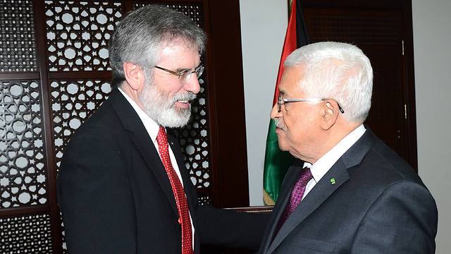 Palestinian President Abbas (right) meeting with Irish legislator Gerry Adams of the Sinn Fein party (Photo: GettyImages)