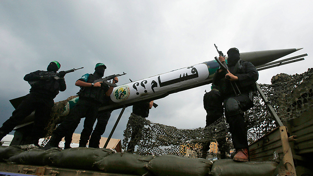 Hamas shows off a rocket. (Photo: Reuters) (Photo: Reuters)