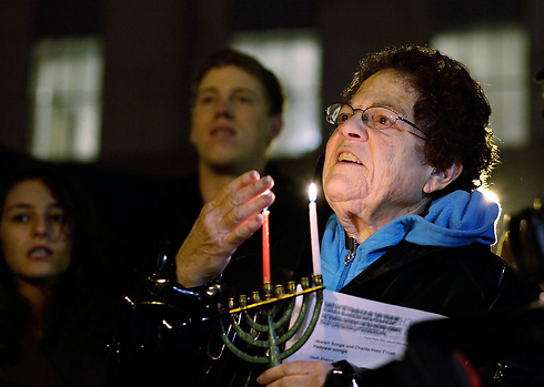 Hanukkah candle lighting at protest against police brutality in North Carolina (Photo: AP) (Photo: AP)