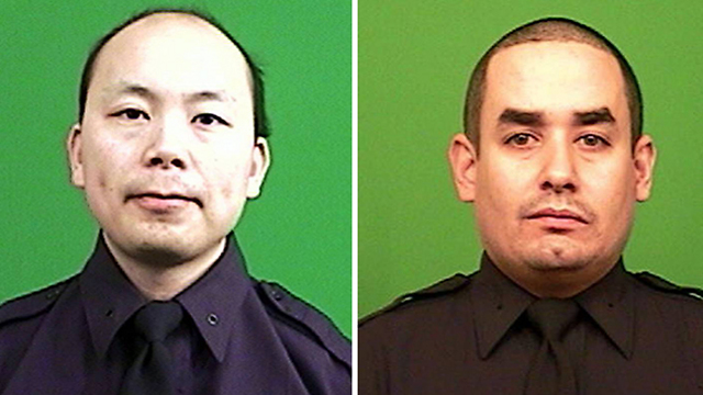השוטרים שנרצחו: רפאל רמוס ולו וונג'ין (צילום: AP) (צילום: AP)