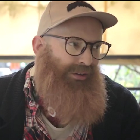 Bennett dressed up as an apologetic hipster in a viral campaign video 