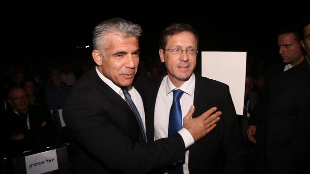 Zionist Union Chairman Isaac Herzog and Yesh Atid Chairman Yair Lapid. Accusing someone of leftism is the worst political threat in Israel (Photo: Motti Kimchi)