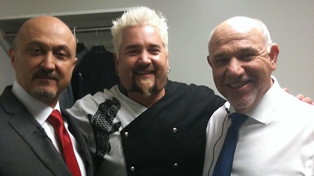 Peace based on shared love of falafal. David Diaan (left) with celebrity chef Guy Fieri (center) and Alan Blumenfeld on the set of 'The Interview'