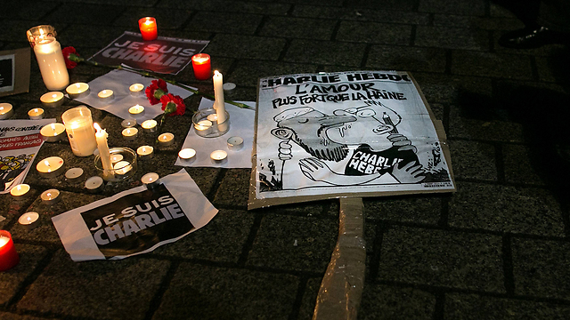 Memorial candles for victims of Paris attack (Photo: Getty Images)