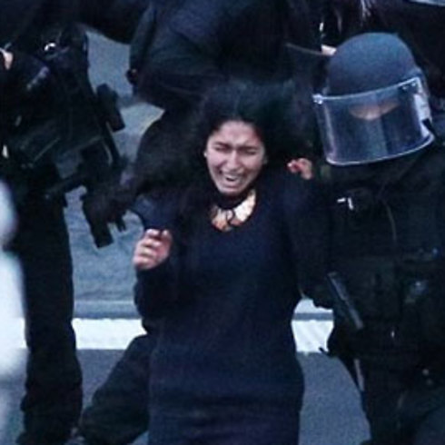 A police officer escorts one of the hostages from the Hyper Cacher attack. 