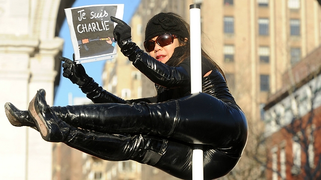 Pole-dancer in New York rally at Washington Square Park. (Photo: MCT)