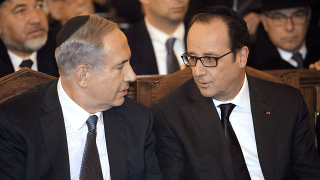 Netanyahu and Hollande at the Paris synagogue memorial for the victims of the Hyper Cacher attack (Photo: AFP) (Photo: AFP)