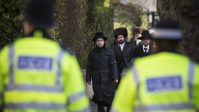 Police at Stamford Hill, London. 'There was a time when Jews had to be protected from Christians. Today the Christians are the ones protecting the Jews from the Muslims' (Photo: Reuters) 