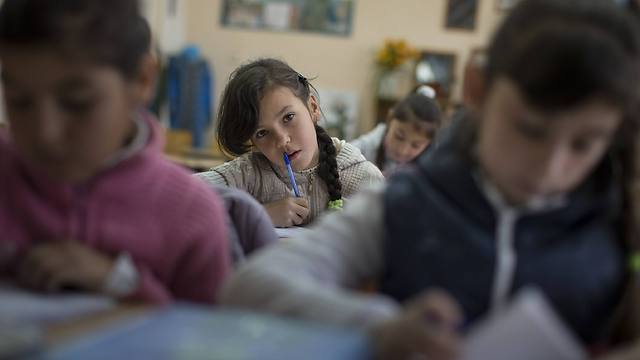 "מלמדים ברוסית". בית ספר בקרים (צילום: AP) (צילום: AP)