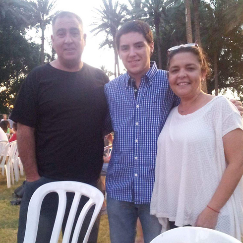 Santiago with his adopted parents in Israel.