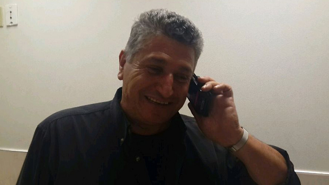 Hasson's father Ramzi on the phone with President Rivlin.